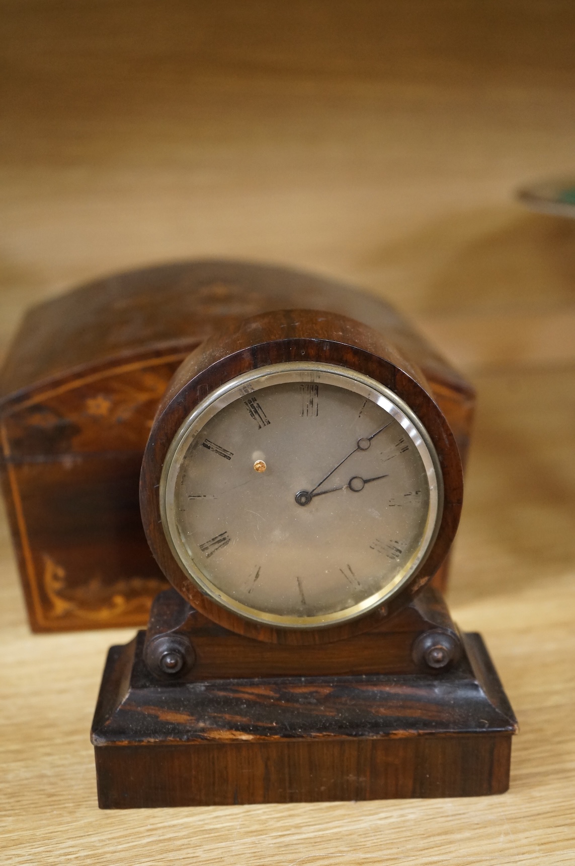 A 19th century rosewood and inlaid silk lined box, a small VAP timepiece and a carved page turner, largest 22cm wide